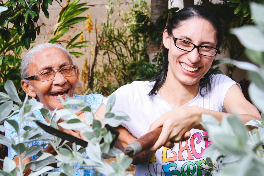 Certified home health aide providing care for senior at home in New Jersey