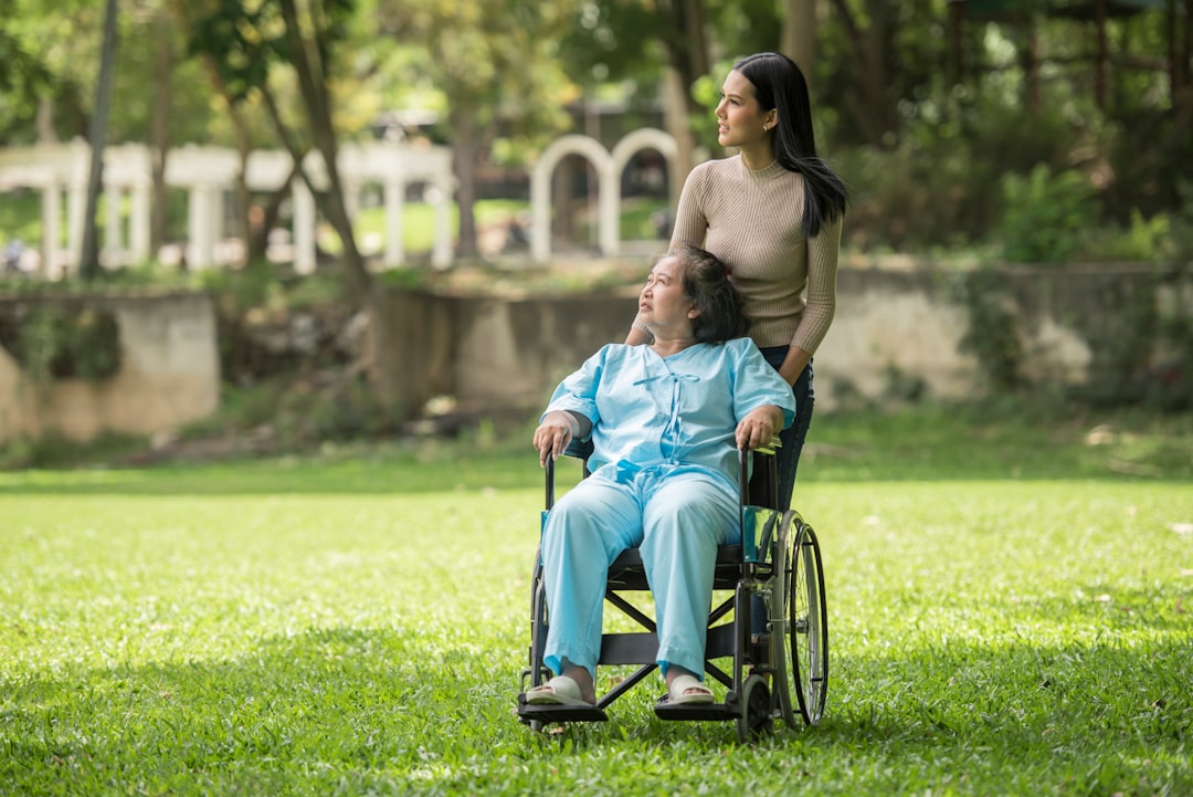 Certified home health aide providing care for senior at home in New Jersey