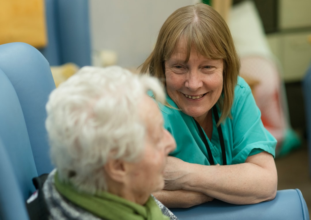 Certified home health aide providing care for senior at home in New Jersey